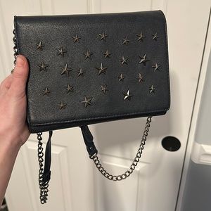 Blue purse with metal stars